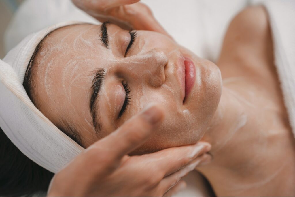 Spa guest receiving a facial - part of he Down To Earth package
