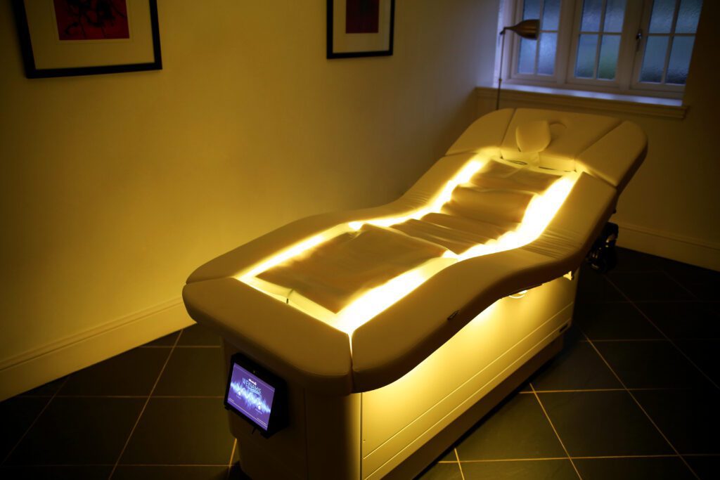 Touchlesss Wellnamis Mindful Bed in a spa treatment room