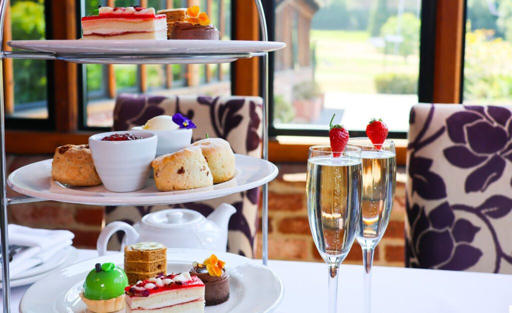 afternoon tea with glasses of prosecco