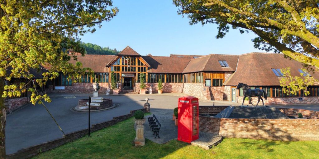 Hotel entrance with phone box in the fore ground