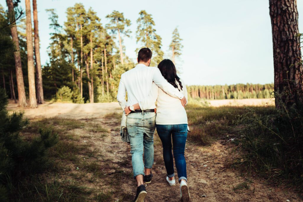 Photo of a couple taking a walk together near Old Thorns Hotel & Resort.