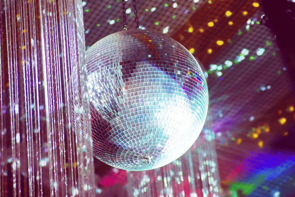 Disco ball at Old Thorns hotel with colourful lighting effects.