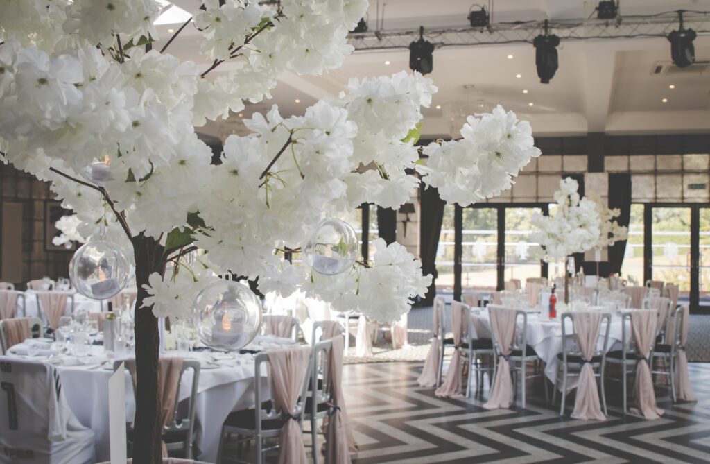 Blossom Trees in Gatsby Ballroom for wedding table centre pieces.