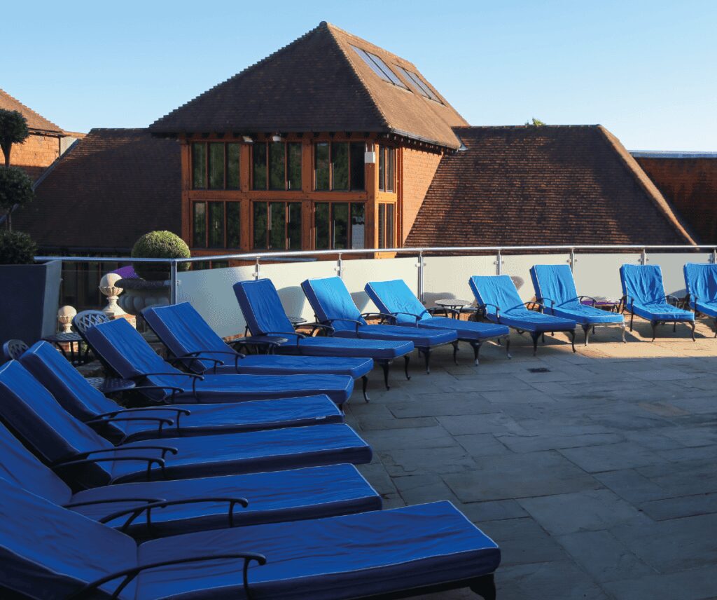 Poolside loungers at Old Thorns hotel and spa.