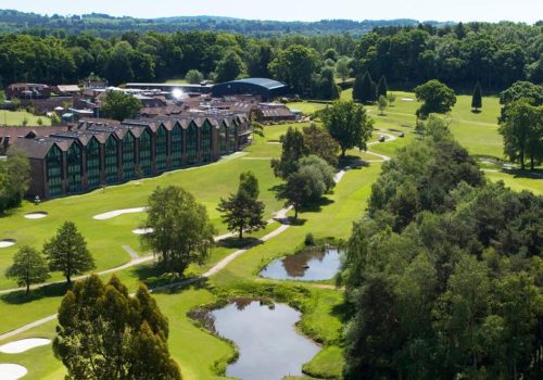 Drone shot of Old Thorns Apartments located on the 9th & 10th tee of the Golf Course