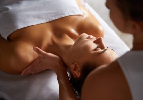 Spa guest receiving a shoulder massage as part of the Change of Tide package