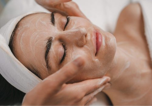 Spa guest receiving a facial - part of he Down To Earth package