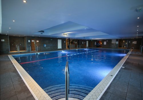 Heated indoor swimming pool in the Elevation Health club